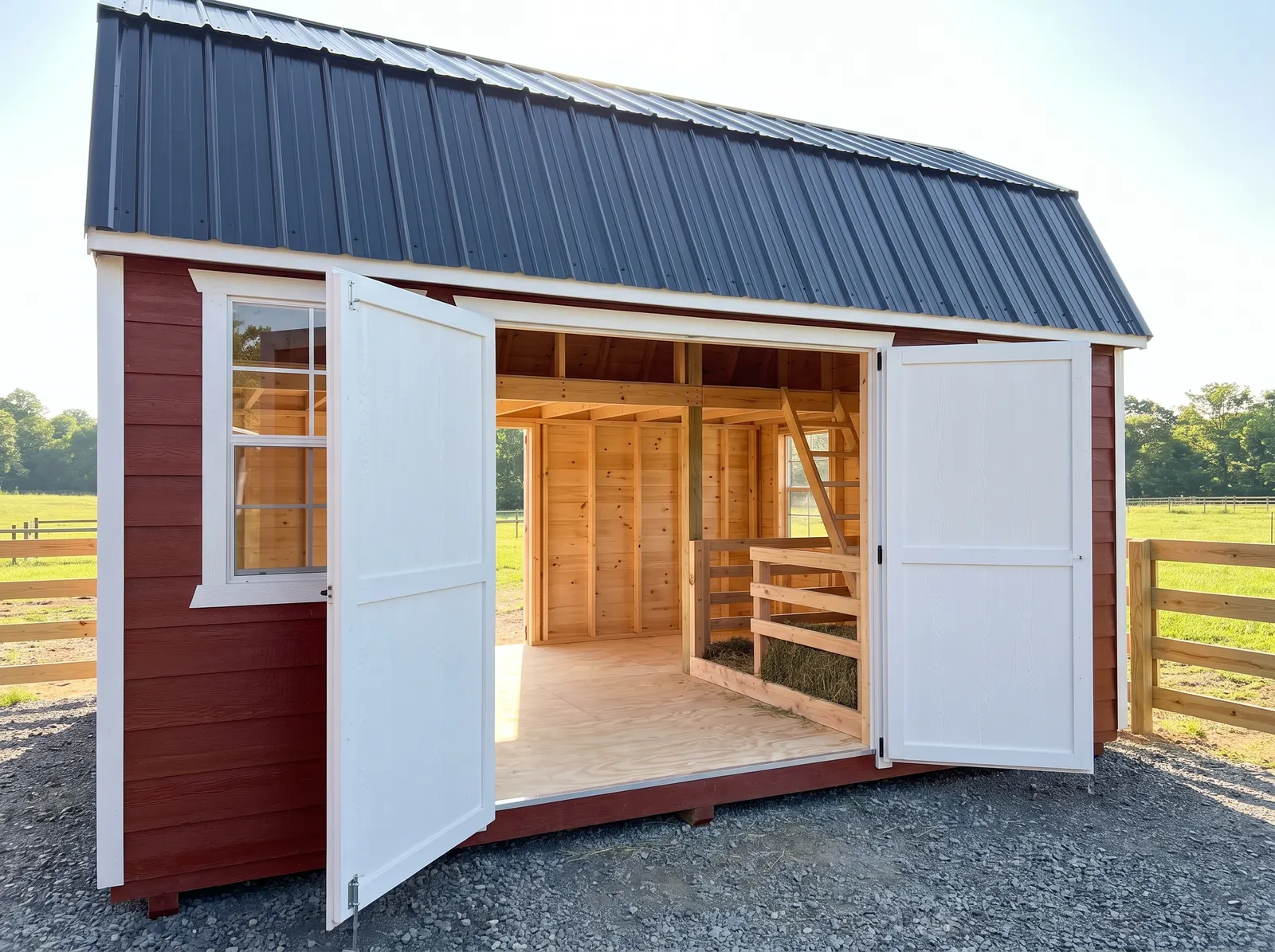 A barn style building with a gambrel roof and loft